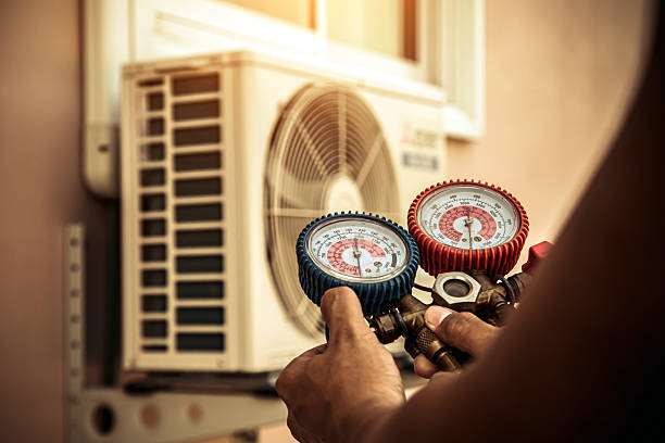 Professional Air Conditioning Service technician working in Pleasant View, UT